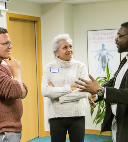 Participants in dialogue during the reception of the 2019 Ikeda Forum