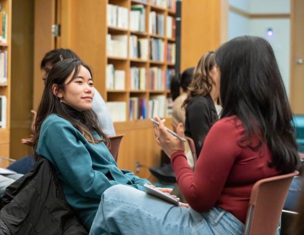 Two participants engage in dialogue at our Dialogue Nights event