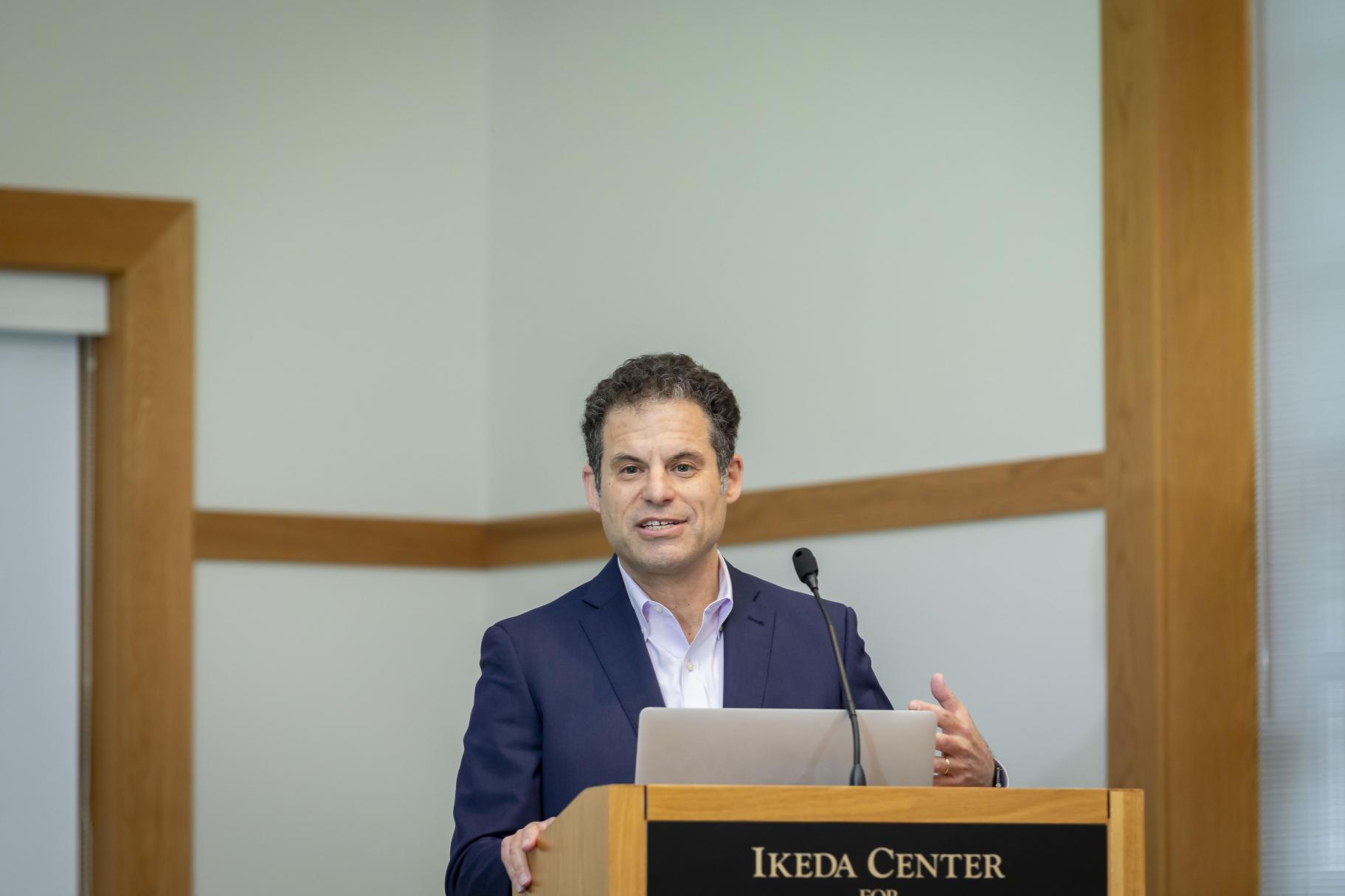 Dr. Eben Weitzman speaking at 2024 Ikeda Forum