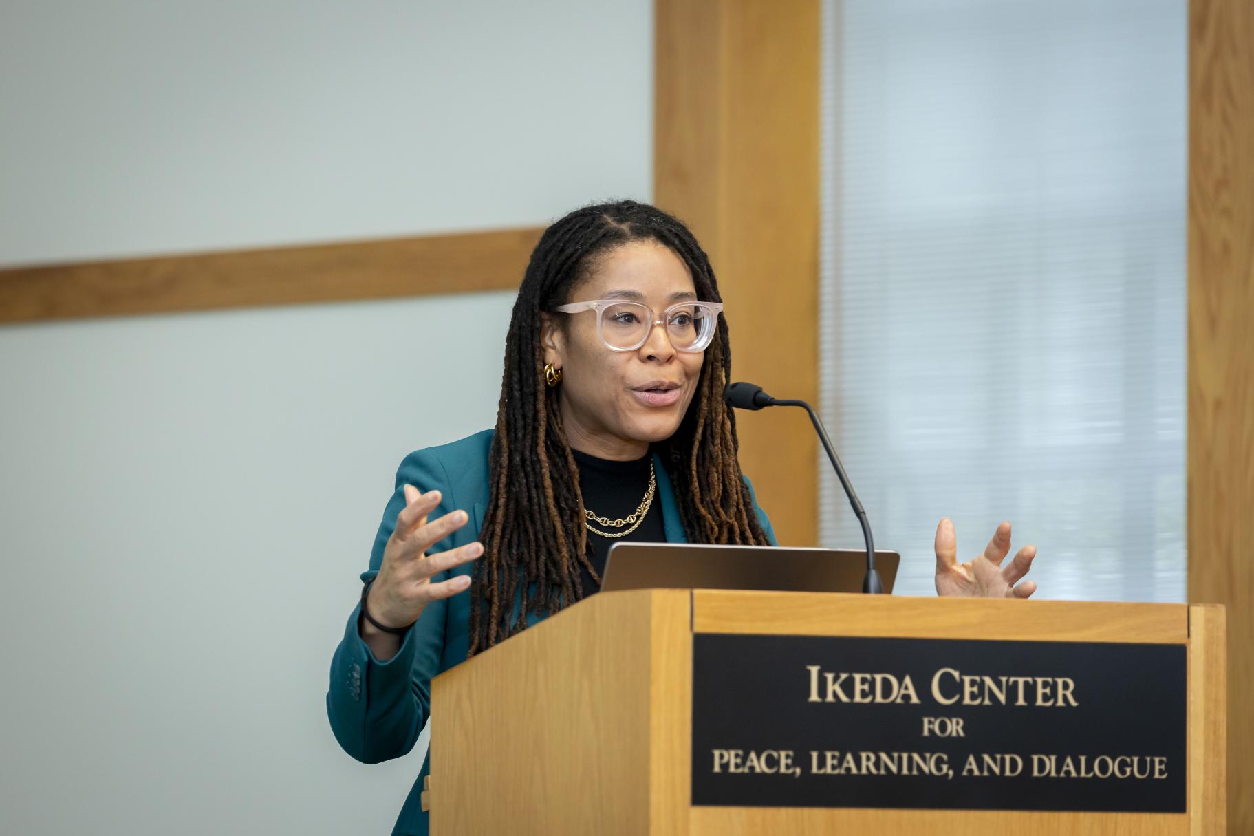 Dr. Lauren Leigh Kelly speaking at 2024 Ikeda Forum