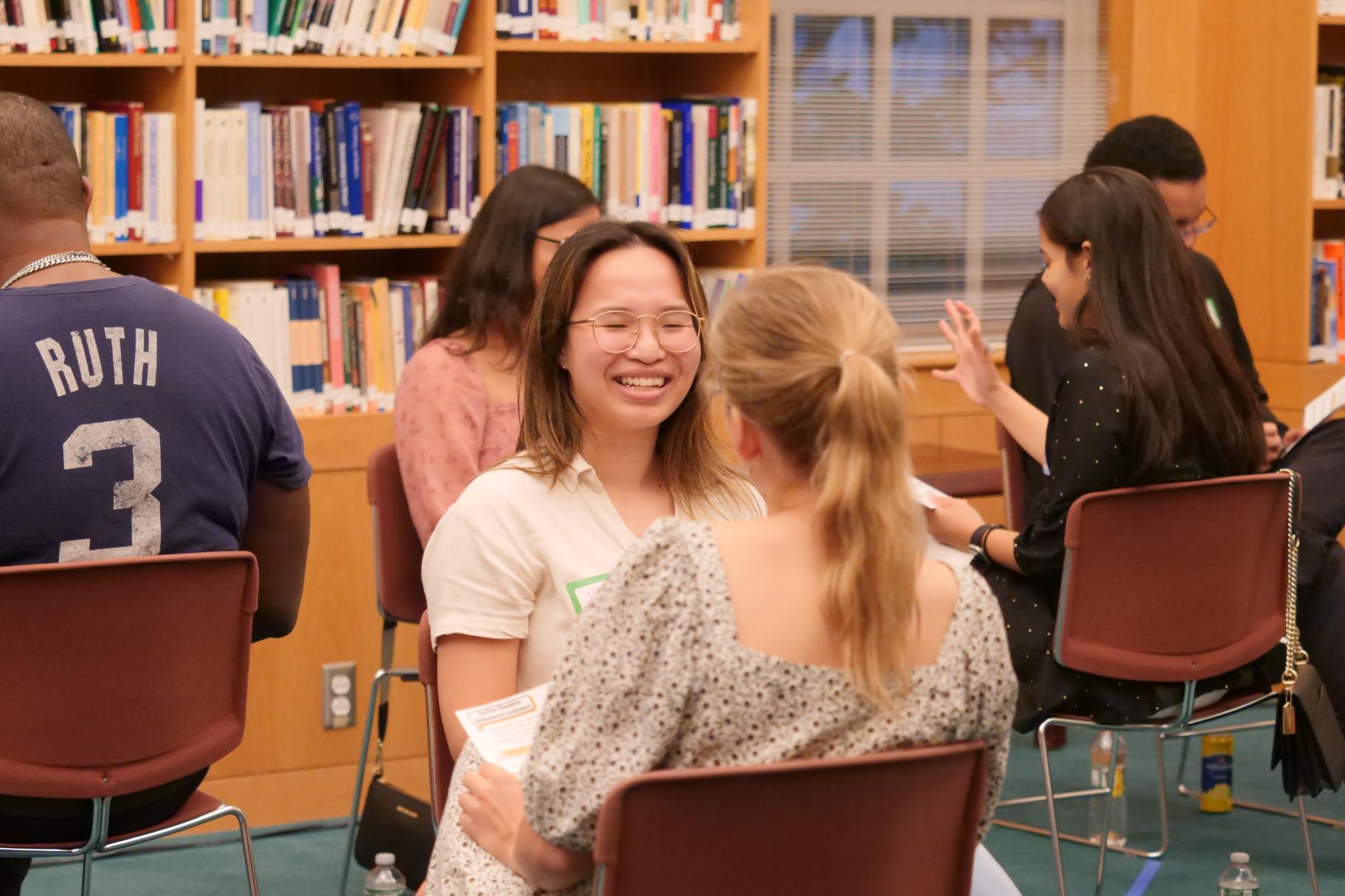 Participants at Dialogue Nights engaging in one-to-one dialogue